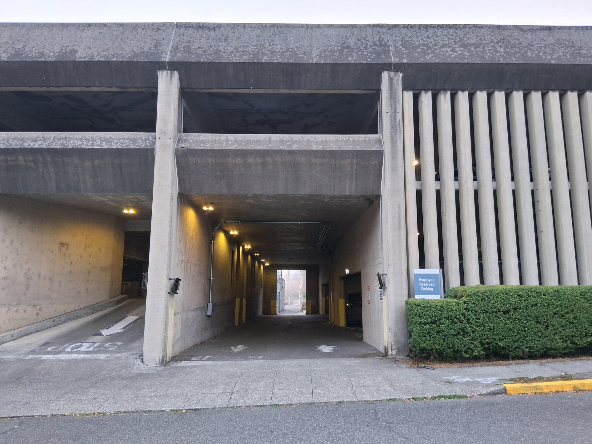Parking garage entrance tunnel leading to the drive-thru